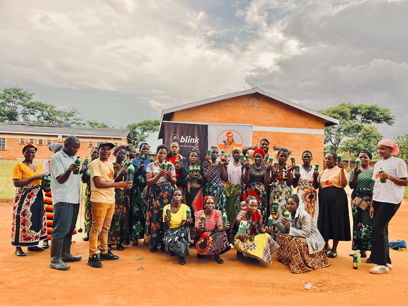 Women of Satoshi Cooperative flyer calling Malawian women to join Bitcoin education program.