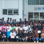 Bitcoin Boma participants receiving Trezor hardware wallets and certificates at UNIMA Bitcoin Education Program March 2026