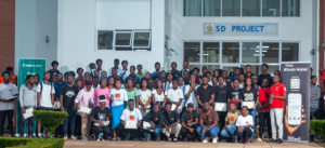 Bitcoin Boma participants receiving Trezor hardware wallets and certificates at UNIMA Bitcoin Education Program March 2026