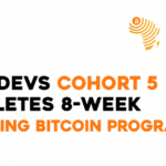 African women developers collaborating on Bitcoin projects during a Dada Devs training session